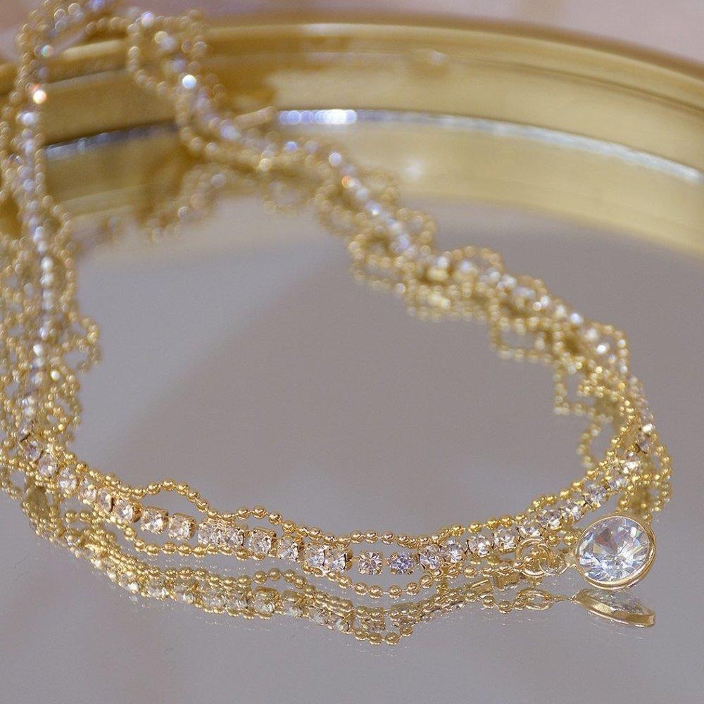 Elegant Gold Necklace with Crystal Accents